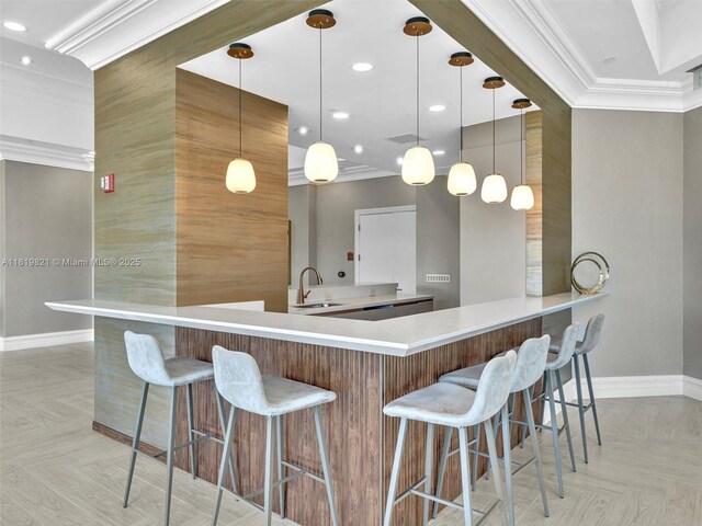 16500 Collins Ave Unit Th-10, Sunny Isles Beach, FL 33160 - kitchen featuring baseboards, crown molding, a sink, recessed lighting, and light countertops