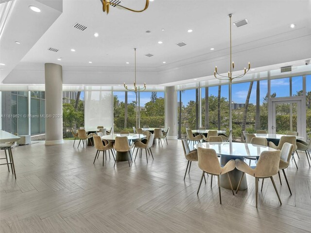 16500 Collins Ave Unit Th-10, Sunny Isles Beach, FL 33160 - dining space featuring healthy amount of natural light, ornamental molding, and recessed lighting