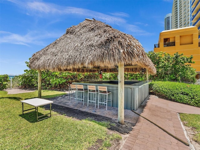 16500 Collins Ave Unit Th-10, Sunny Isles Beach, FL 33160 - view of property's community featuring a lawn, a gazebo, and a patio area
