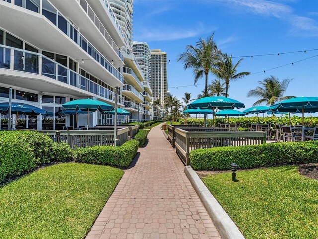 16500 Collins Ave Unit Th-10, Sunny Isles Beach, FL 33160 - surrounding community with a lawn