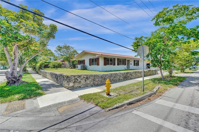 100 NW 23rd Ave, Miami, FL 33125 - single story home featuring stucco siding