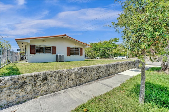 100 NW 23rd Ave, Miami, FL 33125 - view of front of property with stucco siding
