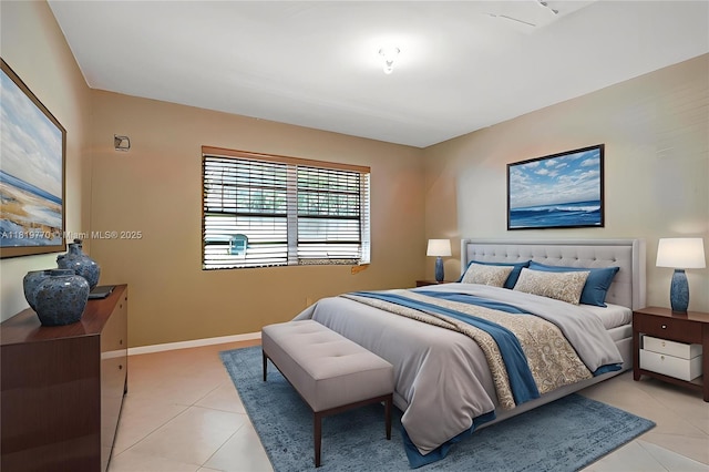 100 NW 23rd Ave, Miami, FL 33125 - bedroom with light tile patterned flooring