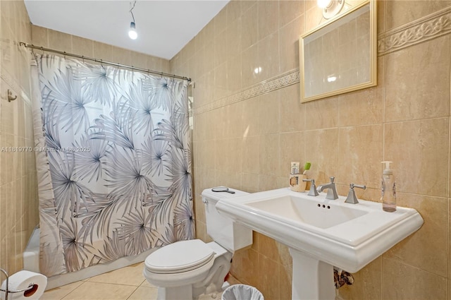 100 NW 23rd Ave, Miami, FL 33125 - bathroom featuring tile walls, tile patterned floors, and shower / bathtub combination with curtain