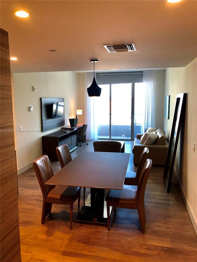 777 N Ocean Dr Unit N207, Hollywood, FL 33019 - dining area featuring wood finished floors and recessed lighting