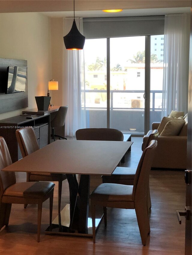 777 N Ocean Dr Unit N207, Hollywood, FL 33019 - bedroom with access to outside and wood finished floors