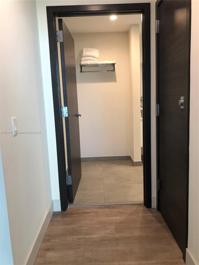 777 N Ocean Dr Unit N207, Hollywood, FL 33019 - hallway with baseboards and wood finished floors