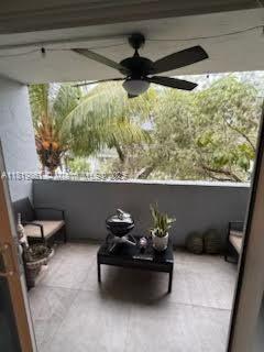 9367 Fontainebleau Blvd Unit G237, Miami, FL 33172 - balcony featuring a ceiling fan