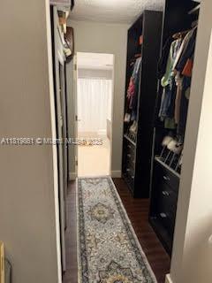 9367 Fontainebleau Blvd Unit G237, Miami, FL 33172 - hall featuring dark wood finished floors