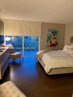 9367 Fontainebleau Blvd Unit G237, Miami, FL 33172 - bedroom featuring wood finished floors