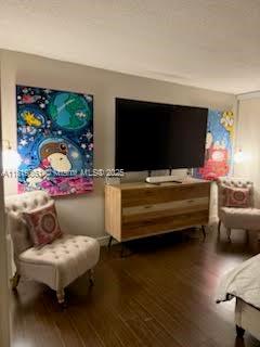 9367 Fontainebleau Blvd Unit G237, Miami, FL 33172 - living area featuring wood finished floors