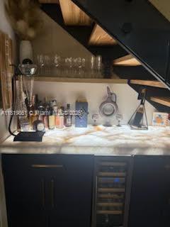 9367 Fontainebleau Blvd Unit G237, Miami, FL 33172 - bar area featuring beverage cooler