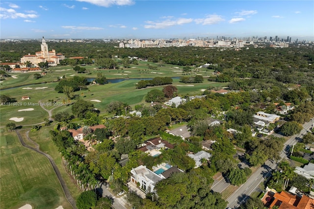 1270 Mariola Ct, Coral Gables, FL 33134 - view of property location with a local golf course, a tree filled landscape, a nearby body of water, and nearby urban area