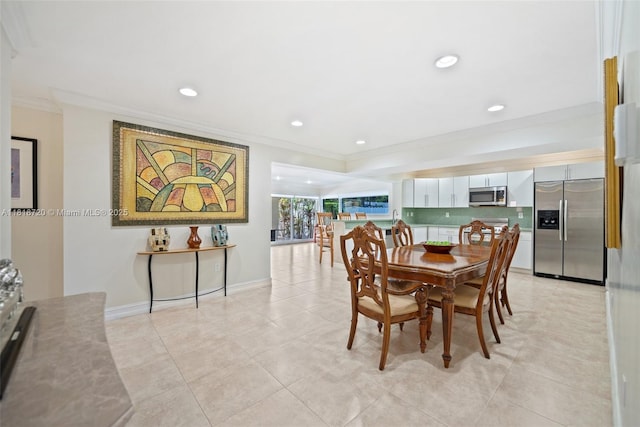6231 SW 27th St, Miami, FL 33155 - dining room with crown molding, light tile patterned floors, and recessed lighting