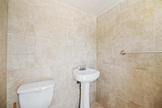 6231 SW 27th St, Miami, FL 33155 - half bathroom featuring toilet and tile walls