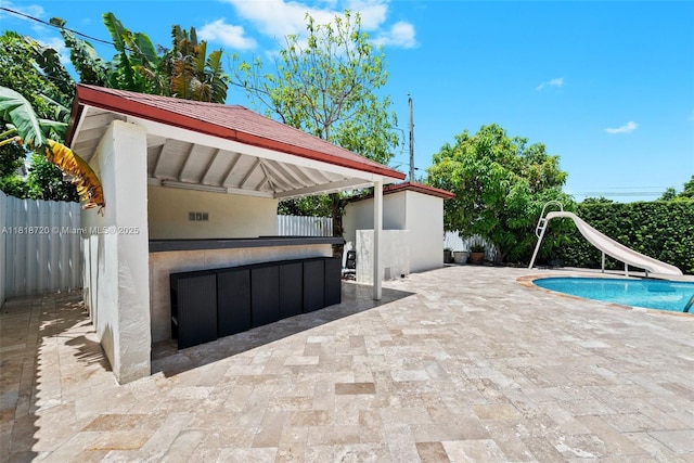 6231 SW 27th St, Miami, FL 33155 - view of pool with a water slide and a patio area