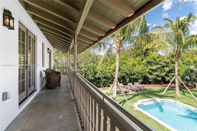balcony with view of pool area