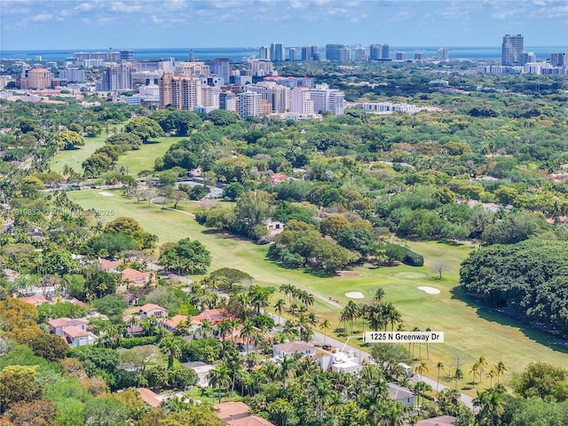view of urban area featuring a golf course