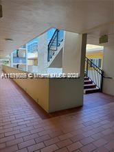 8888 Collins Ave Unit 318, Surfside, FL 33154 - reception featuring stairs