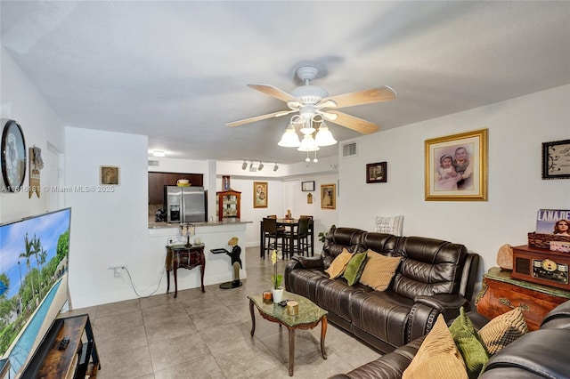 15400 SW 284th St Unit 1204, Homestead, FL 33033 - living area with a ceiling fan and light tile patterned floors
