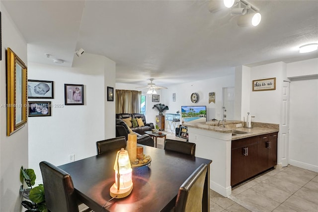 15400 SW 284th St Unit 1204, Homestead, FL 33033 - dining room with ceiling fan and light tile patterned flooring