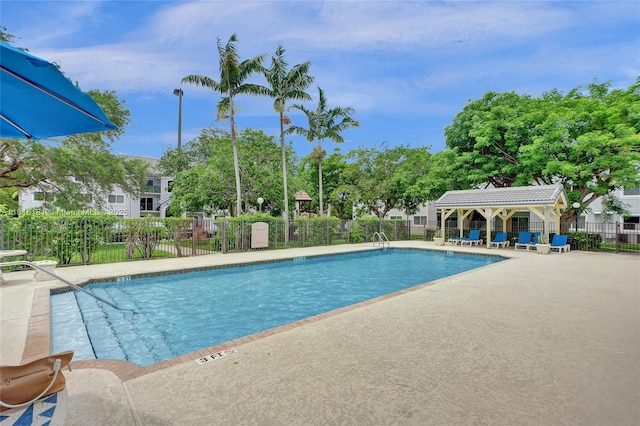 15400 SW 284th St Unit 1204, Homestead, FL 33033 - community pool featuring a patio area