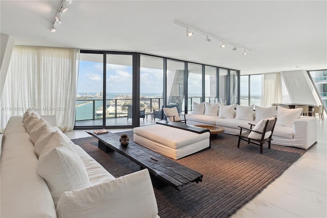 1000 Biscayne Blvd Unit 4401, Miami, FL 33132 - living area featuring rail lighting and expansive windows