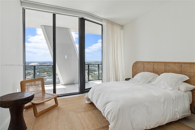 1000 Biscayne Blvd Unit 4401, Miami, FL 33132 - bedroom featuring floor to ceiling windows and access to outside