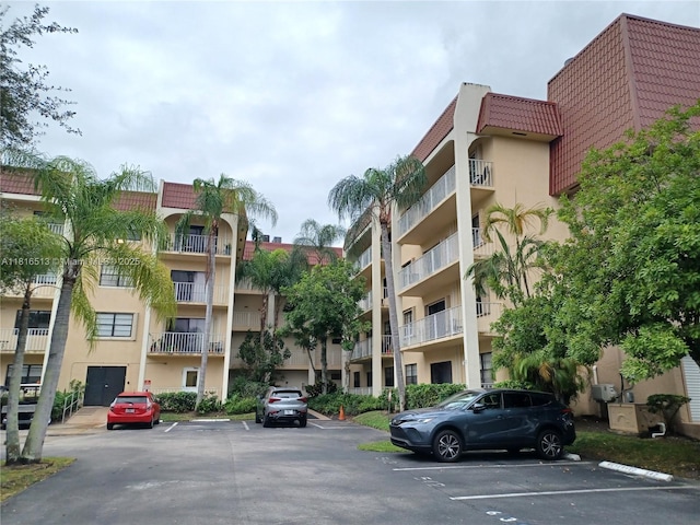 9301 SW 92nd Ave Unit A320, Miami, FL 33176 - view of apartment building / complex featuring uncovered parking
