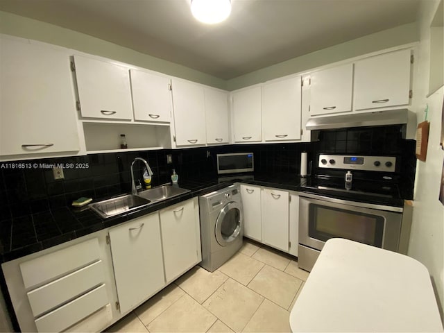 9301 SW 92nd Ave Unit A320, Miami, FL 33176 - kitchen with under cabinet range hood, washer / dryer, appliances with stainless steel finishes, a sink, and tasteful backsplash
