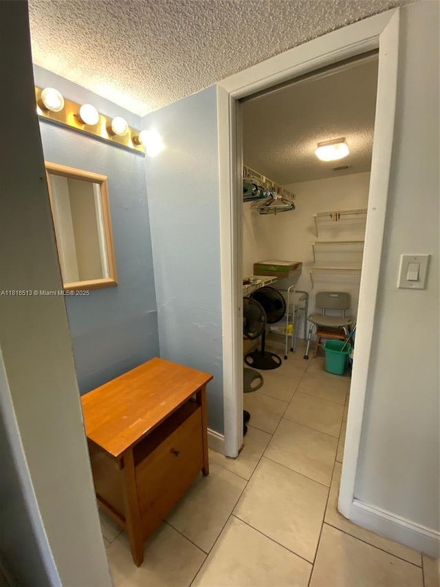 9301 SW 92nd Ave Unit A320, Miami, FL 33176 - bathroom with a textured ceiling and tile patterned flooring