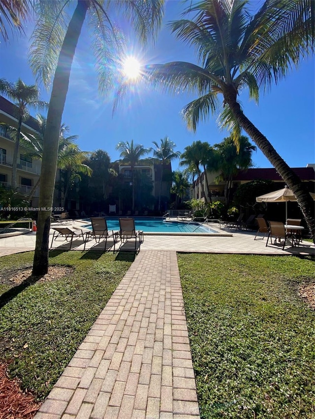 9301 SW 92nd Ave Unit A320, Miami, FL 33176 - community pool with a patio area and a yard