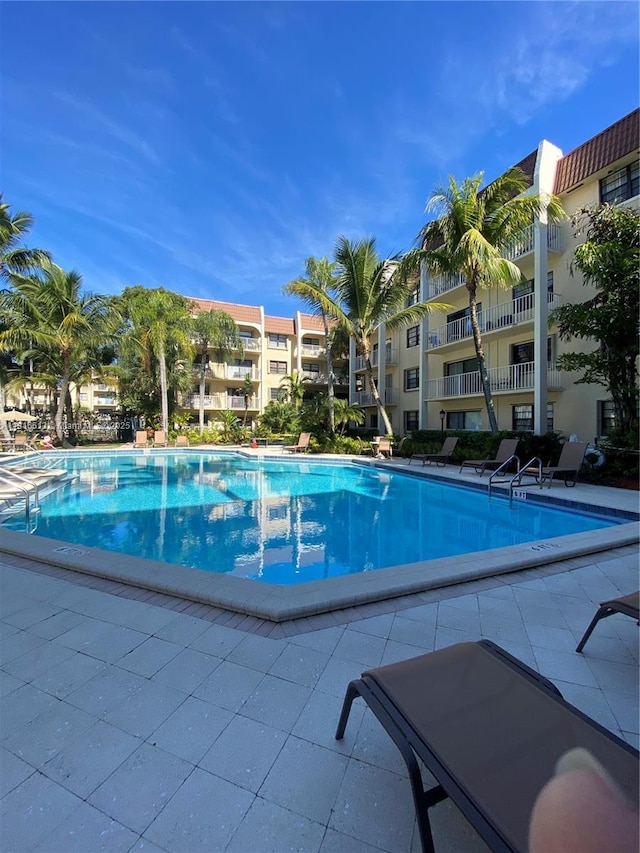 9301 SW 92nd Ave Unit A320, Miami, FL 33176 - community pool featuring a patio area