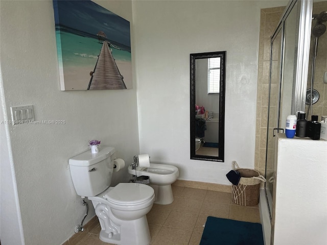 16419 SW 84th St, Miami, FL 33193 - bathroom with a stall shower, a bidet, and tile patterned flooring
