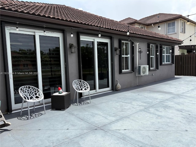16419 SW 84th St, Miami, FL 33193 - rear view of house with a patio and stucco siding