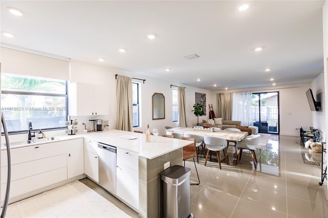 3645 SW 3rd St, Miami, FL 33135 - kitchen featuring dishwasher, a sink, a peninsula, open floor plan, and recessed lighting