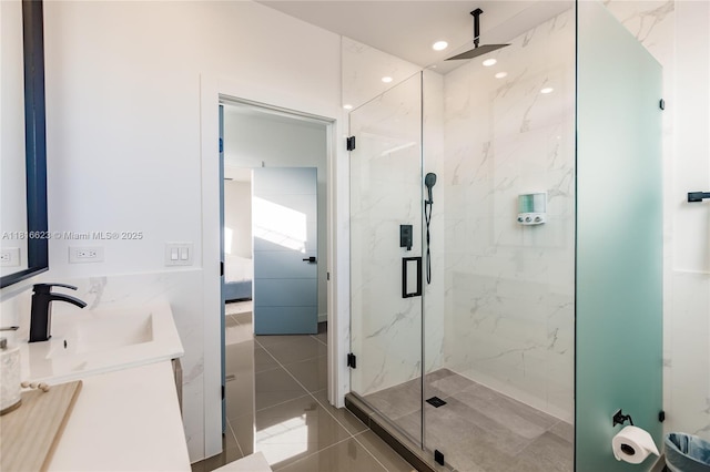 3645 SW 3rd St, Miami, FL 33135 - full bathroom with a marble finish shower, connected bathroom, double vanity, and tile patterned floors