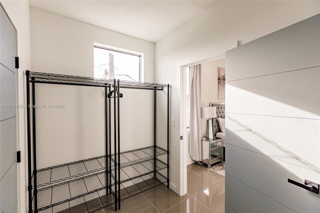 3645 SW 3rd St, Miami, FL 33135 - hall with tile patterned flooring and baseboards