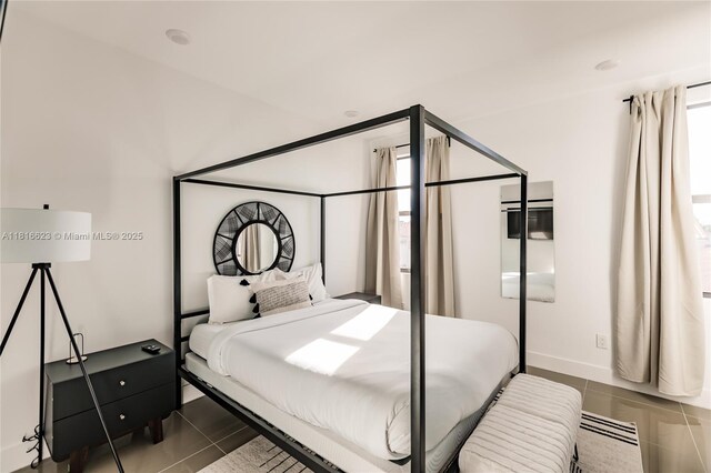 3645 SW 3rd St, Miami, FL 33135 - bedroom featuring tile patterned floors and multiple windows