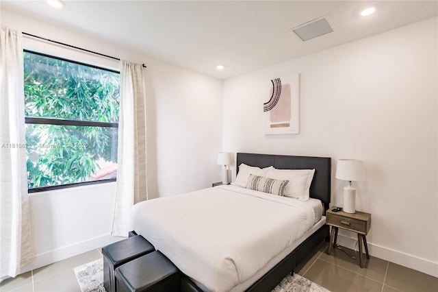 3645 SW 3rd St, Miami, FL 33135 - bedroom featuring baseboards, recessed lighting, and tile patterned floors
