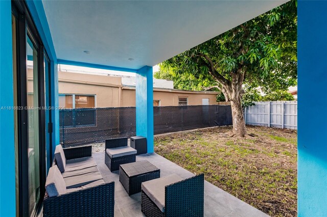 3645 SW 3rd St, Miami, FL 33135 - fenced backyard with a patio area