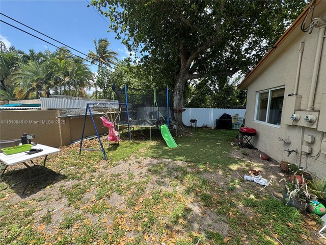 2510 SW 62nd Ave, Miramar, FL 33023 - view of yard featuring a trampoline