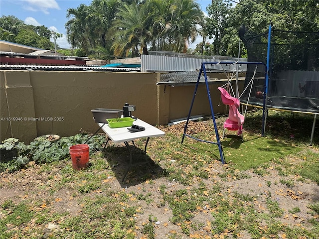 2510 SW 62nd Ave, Miramar, FL 33023 - view of yard featuring a trampoline