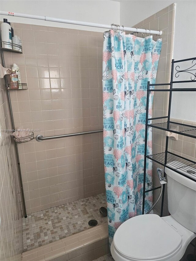 2510 SW 62nd Ave, Miramar, FL 33023 - bathroom featuring a stall shower and toilet