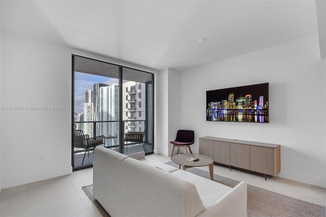 601 NE 6th St Unit 3709, Miami, FL 33132 - living area featuring light tile patterned floors, floor to ceiling windows, and baseboards
