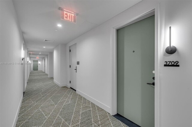 601 NE 6th St Unit 3709, Miami, FL 33132 - hall featuring carpet floors, recessed lighting, and baseboards