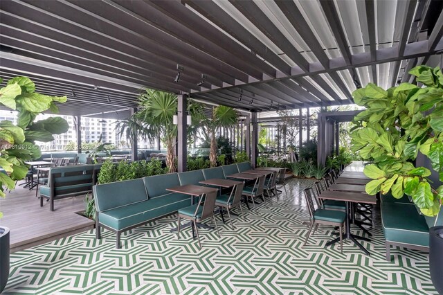 601 NE 6th St Unit 3709, Miami, FL 33132 - view of patio with outdoor dining space, outdoor lounge area, and a deck