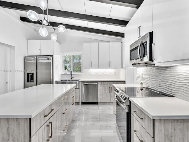 2454 W Nassau Ln, Fort Lauderdale, FL 33312 - kitchen with stainless steel appliances, modern cabinets, decorative backsplash, and light marble finish floors