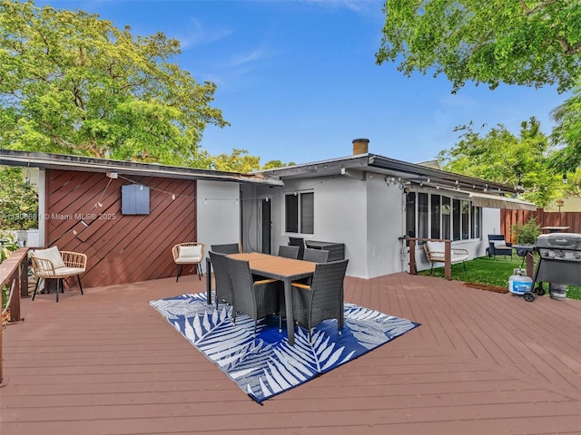 2454 W Nassau Ln, Fort Lauderdale, FL 33312 - wooden terrace featuring grilling area and outdoor dining area