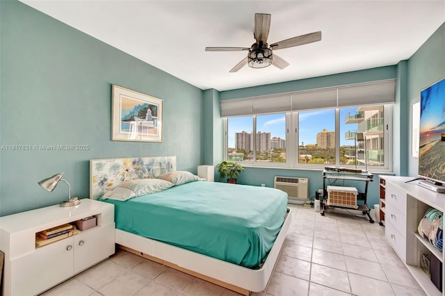 3233 NE 34th St Unit 611, Fort Lauderdale, FL 33308 - bedroom with ceiling fan, a wall mounted air conditioner, and light tile patterned flooring